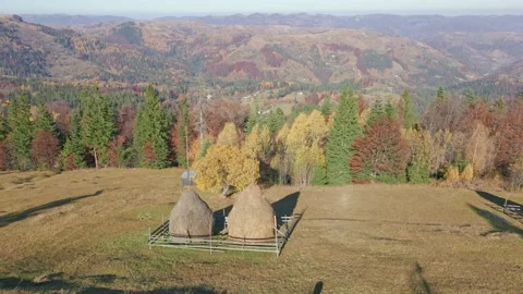 Haystacks in mountains Stock Footage 165162300