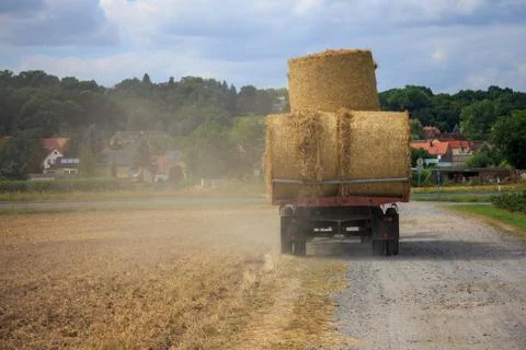 Haystacks on tractor Stock Photos