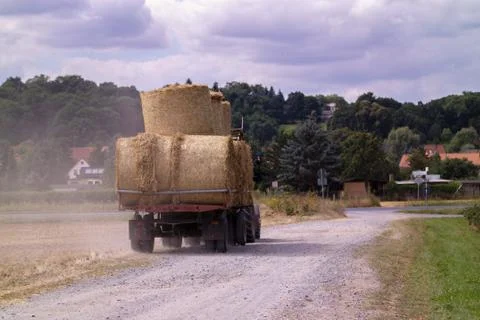 Haystacks on tractor Stock Photos