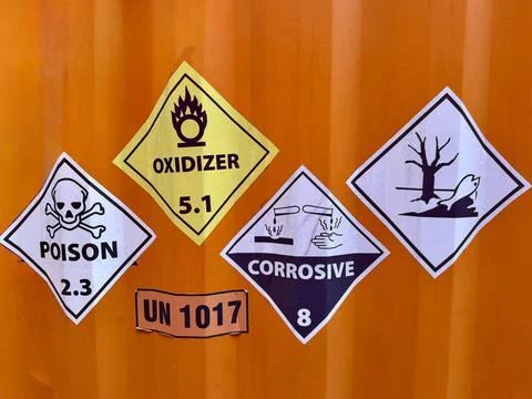Hazardous Cargo Labels on Shipping Container for Dangerous Goods Transport Stock Photos