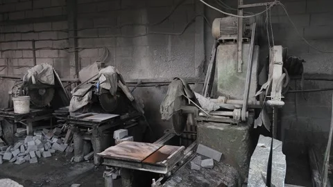 Hazardous Dust Covered Stone Cutting Workshop And Masonry Machinery Stock Footage 332059852