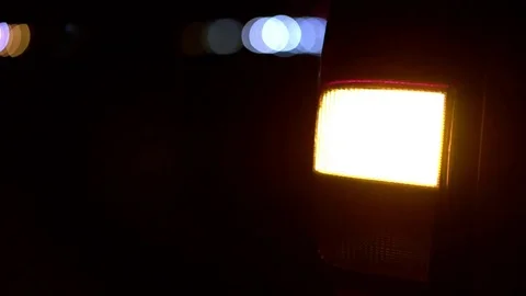 Hazardous lights flashing on stranded car by side of road 4k Video stock 75614726