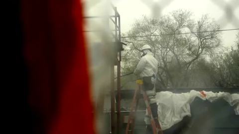 Hazardous Materials Worker Spraying Water Stock Footage 234082803