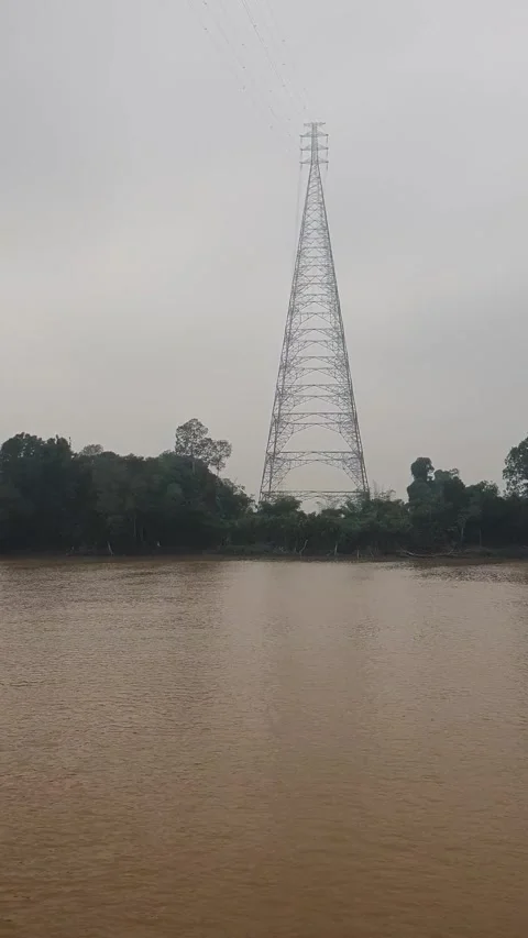 Haze and thick smoke from forest fires blanketing a river in West Kalimantan Video stock 345693414