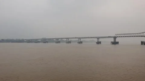 Haze and thick smoke from forest fires blanketing a river in West Kalimantan Video stock 345693446