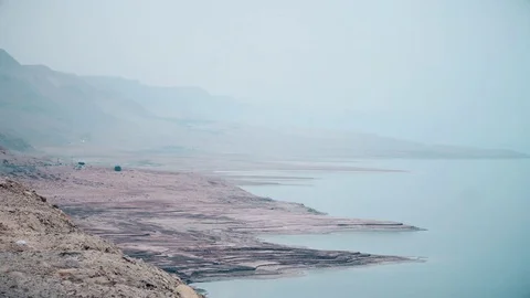 A haze over the Dead Sea, side road аnd a beautiful landscape,a view of the sea 스톡 동영상 82559987