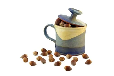 Hazelnut and ceramic mug 写真素材