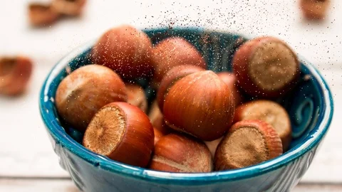 Hazelnut in a bowl magic pollen Stock Footage 117617634