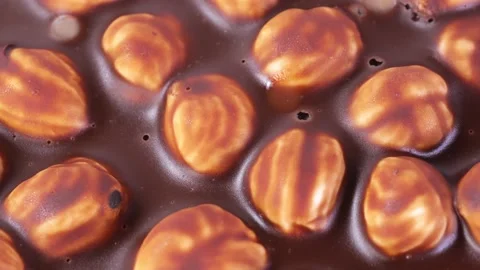 Hazelnut close-up. chocolate cake close-up. rotation macro video Stock Footage 198911194