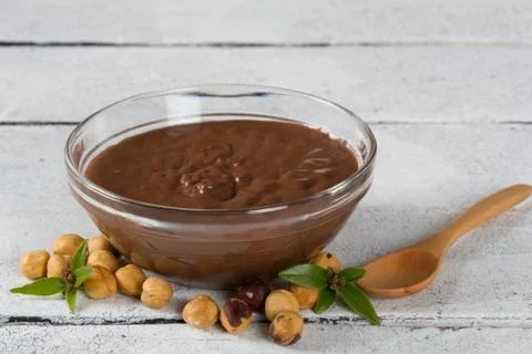 Hazelnut cream with hazelnut nuts Stock Photos