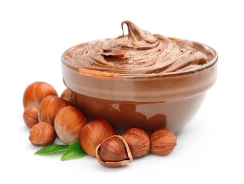 Hazelnut cream with hazelnut nuts Stock Photos