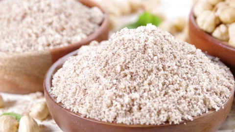 Hazelnut flour with whole nuts Stock Footage 169938154
