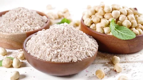 Hazelnut flour with whole nuts Vídeo Stock 169938189