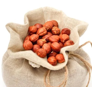 Hazelnut i the sack bag Stock Photos