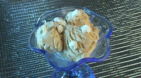 Hazelnut icecream with chocolate topping Stock Footage 5352741