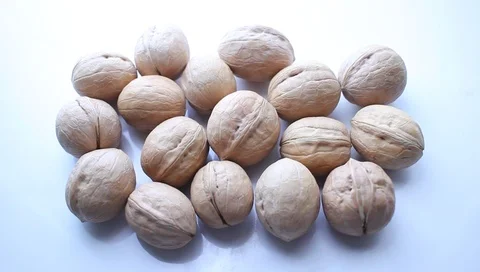 Hazelnut a lot on a white table close-up, hand counts hazelnut 스톡 동영상 94225025