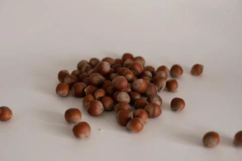 Hazelnut lying on a white background. Stock Photos