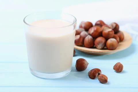 Hazelnut milk on the table. Vegetable milk, Vegetarian milk. Stock-Fotos