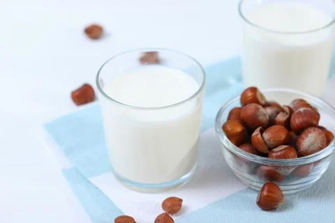 Hazelnut milk on the table. Vegetable milk, Vegetarian milk. Photos