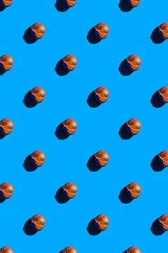Hazelnut pattern on blue background, colorful flat lay food texture top view 스톡 사진