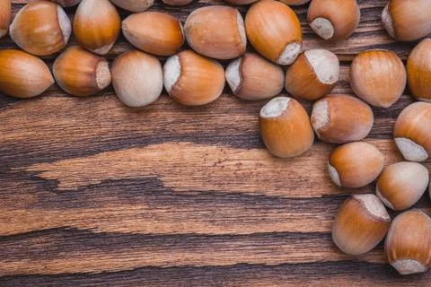 Hazelnut on a wooden table Stock Photos