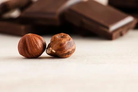 Hazelnuts and chocolate Stock Photos