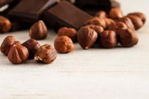 Hazelnuts and chocolate Stock Photos