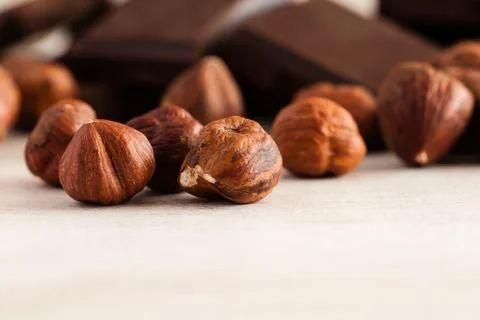 Hazelnuts and chocolate Stock Photos