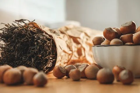 Hazelnuts and dried herbs create a cozy kitchen atmosphere in autumn Stock Photos