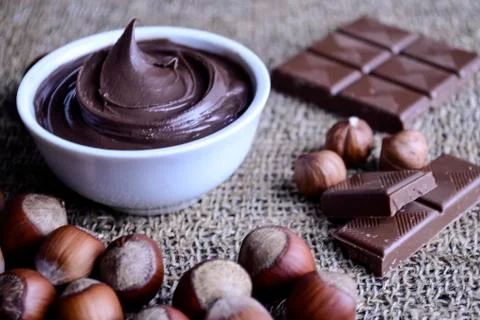 Hazelnuts and nuts lying the table. Healthy snack food. Stock Photos