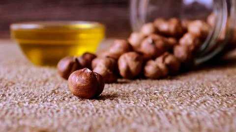 Hazelnuts and nuts lying the table. Healthy snack food. Stock Photos