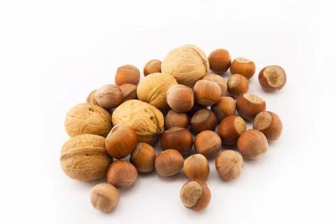 Hazelnuts and walnuts isolated on white Foto stock