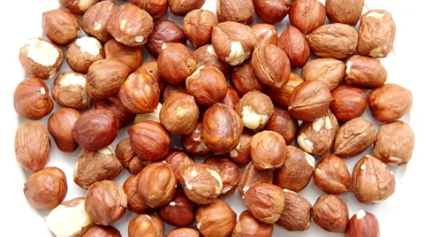 Hazelnuts are spinning on a table. Stock Footage 35366239