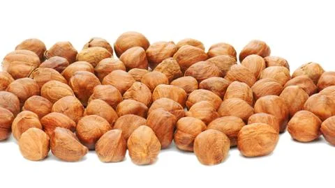 Hazelnuts background isolated on white background. Stock Photos