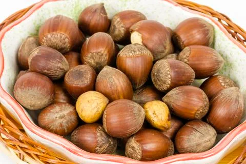 Hazelnuts in a basket Fotos Stock