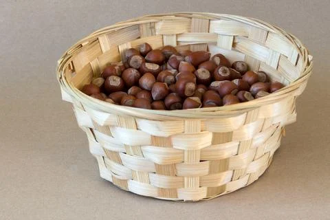 Hazelnuts in basket Stock Photos