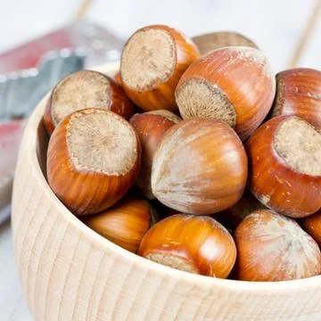 Hazelnuts in a bowl Stock Photos
