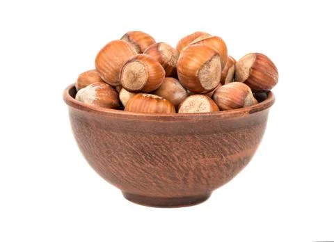 Hazelnuts in bowl Foto stock