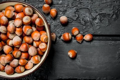 Hazelnuts in the bowl . Stock Photos