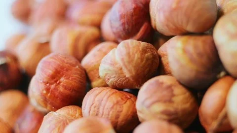 Hazelnuts close-up. Smooth rotation. Filler for walnut paste and chocolate. Stock Footage 84149403