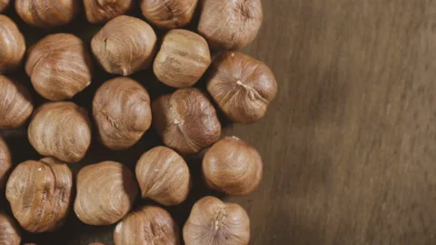 Hazelnuts close-up. Smooth rotation. Filler for walnut paste and chocolate. Stock Footage 92058733