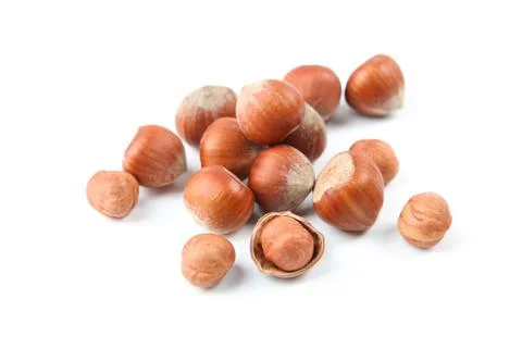 Hazelnuts close up on white background Stock-Fotos