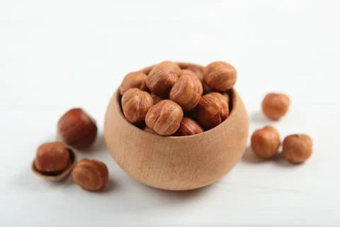 Hazelnuts close up on white background Stock-Fotos