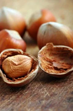 Hazelnuts, filbert on old wooden background Stock Photos