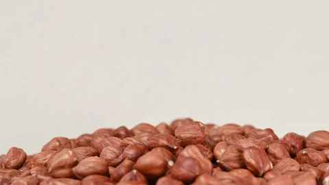 Hazelnuts heap rotating. Organic snack. Pile of hazelnuts without shell. Ve.. Stock Footage 336497539