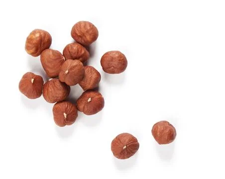 Hazelnuts isolated on white background. Top view. Stock Photos