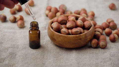 Hazelnuts, oil for the use of nuts in cosmetics, nutritious elements. 動画素材 237426192