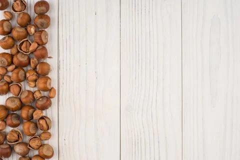 Hazelnuts on a old wooden table. Stock-Fotos