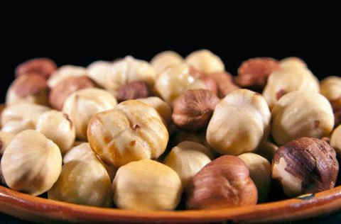 Hazelnuts on the plate Stock Photos