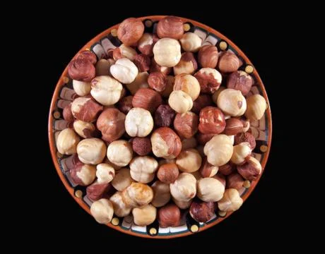 Hazelnuts on the plate Stock Photos